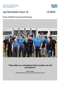 The image shows a group of people wearing blue and black polo shirts