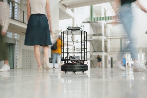 Robots and people in the hallway
